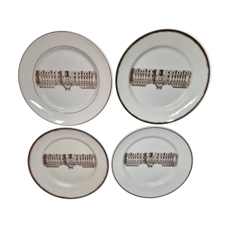 Set of four plates with palace decoration of the faience factory of Gien