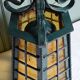 Wrought iron wall lantern & amber cathedral glass