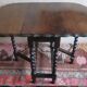 Antique farmhouse patinated extendable table in oak with carved edge, 1900