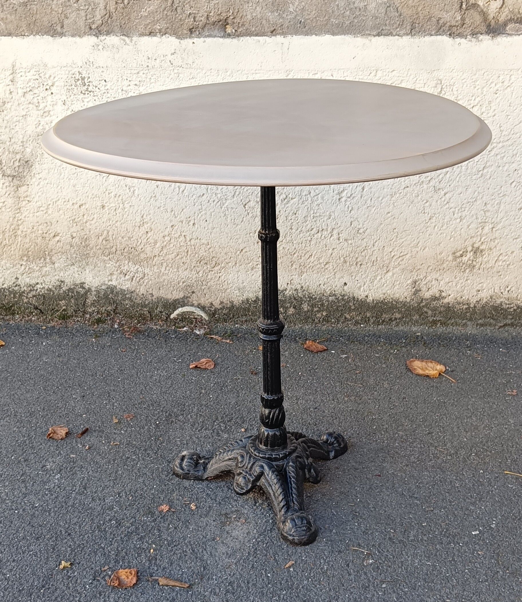 Round wooden bistro table