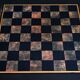 Large chessboard coffee table in mahogany, Jansen style – 2nd half of the 20th century.
