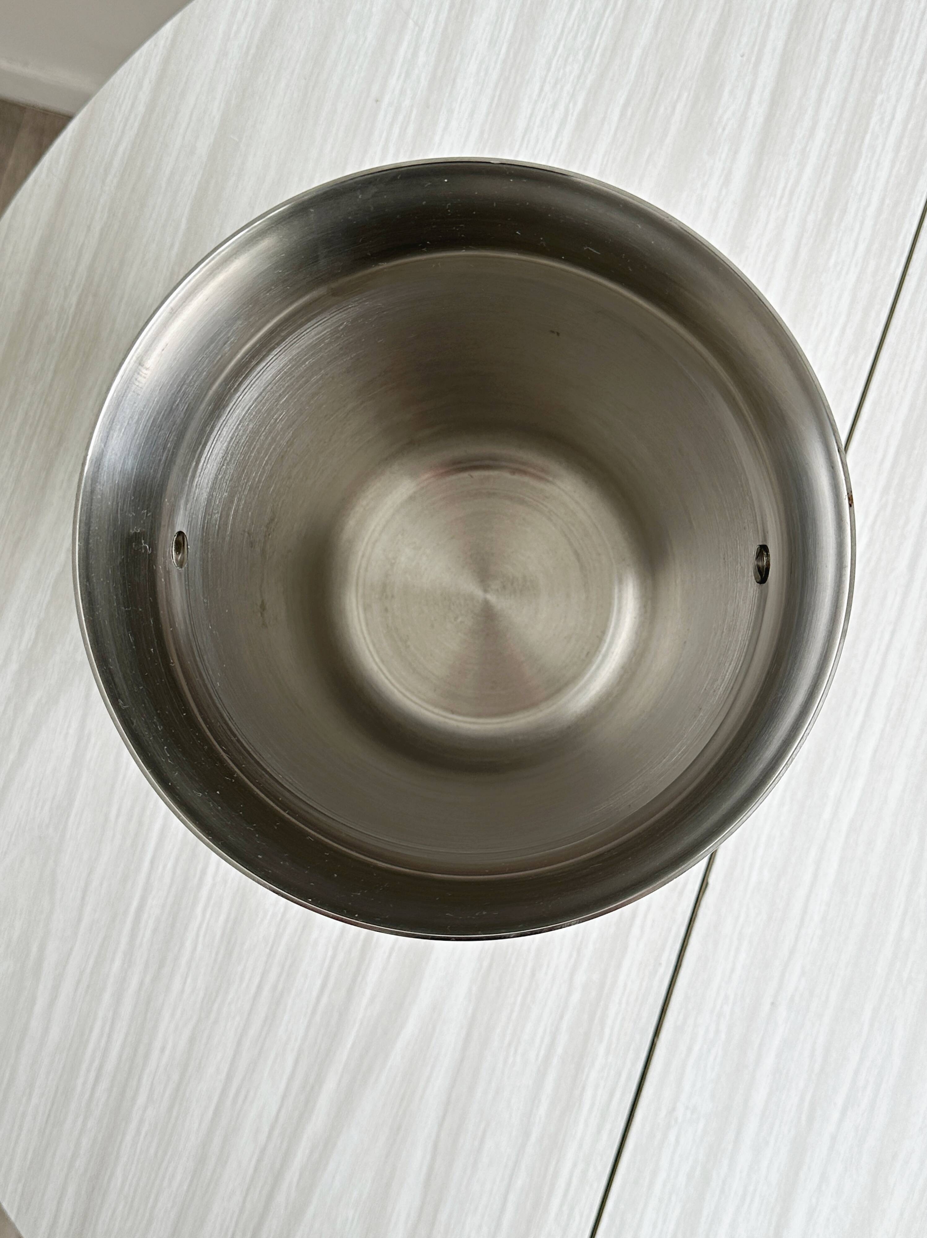 Shiny metal champagne bucket