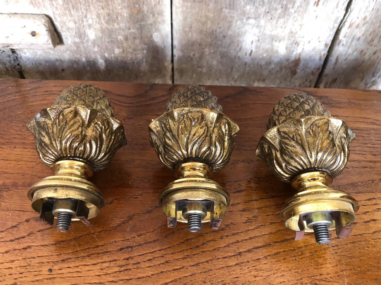 Set of 3 pine cones curtain rod golden bronze
