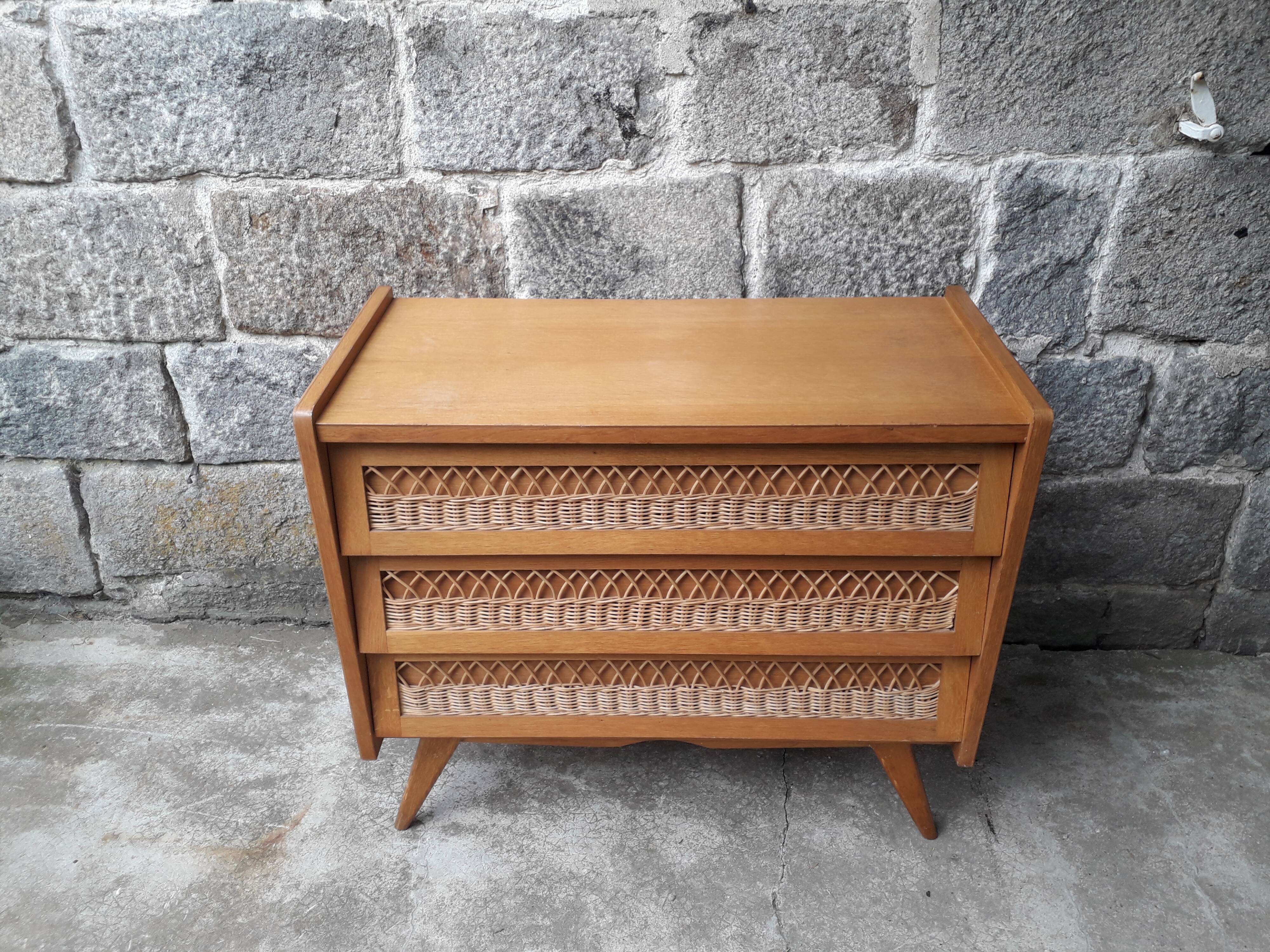 Vintage chest of drawers in rattan compass feet