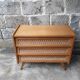 Commode vintage en rotin pieds compas