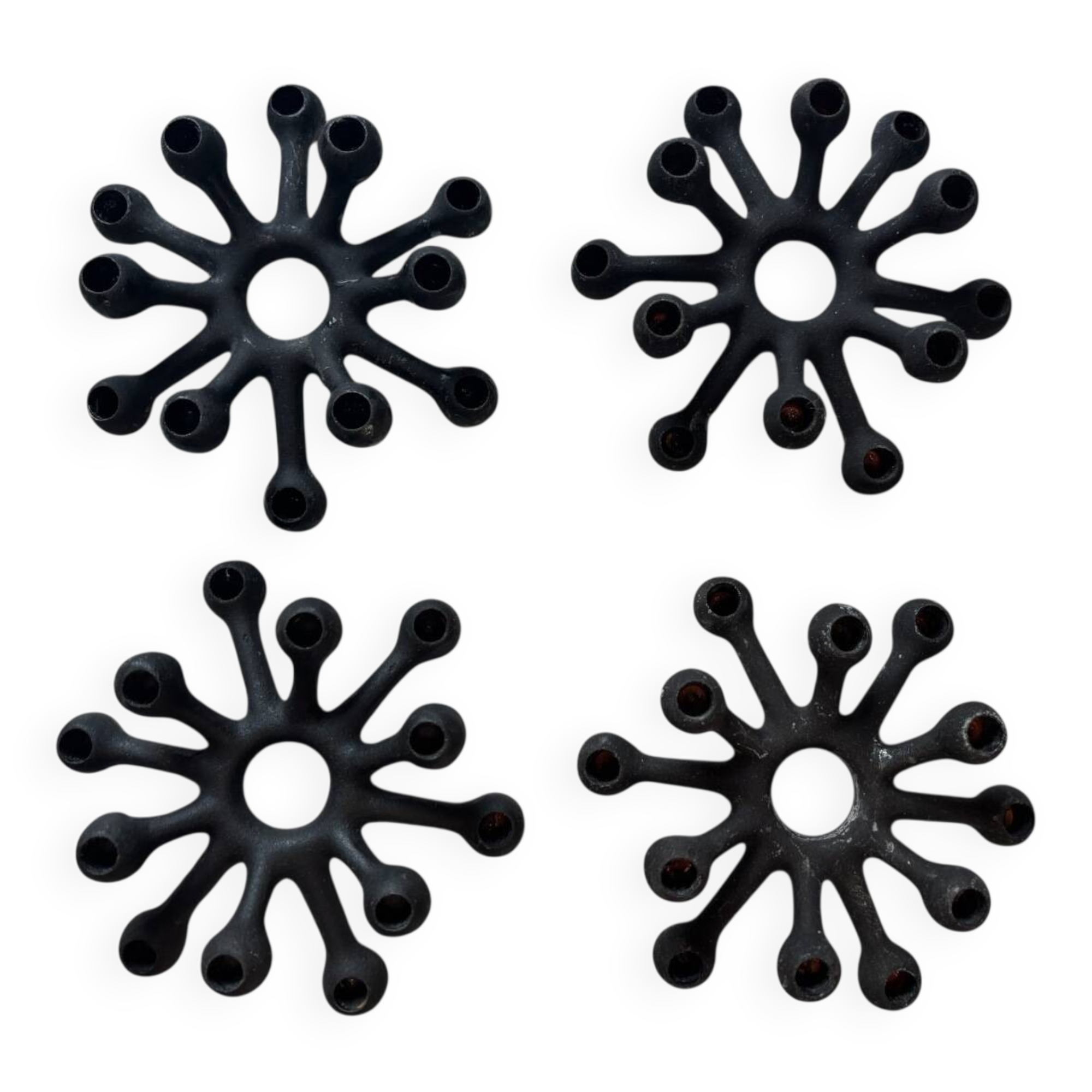 4 "Spider" candle holders by Jens Quistgaard for Dansk Designs, Scandinavian 1960s.