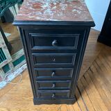 Wooden chest of drawers with red marble top