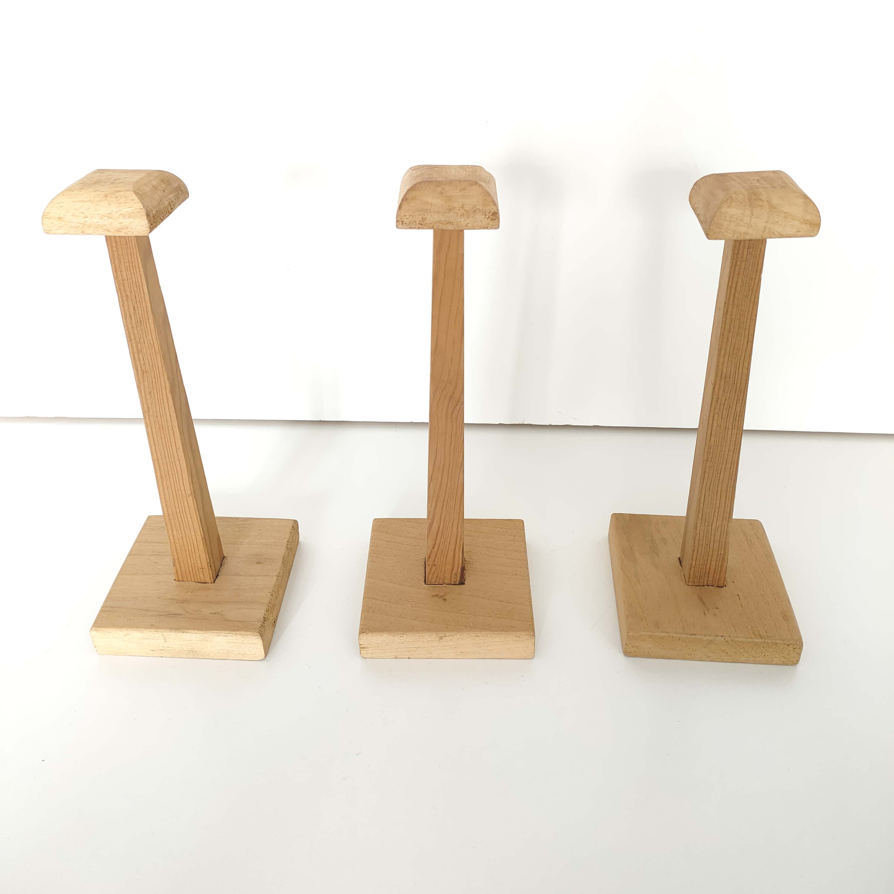 Trio wooden hats holders