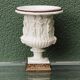 Pair of Medicis Borghese vases in porcelain biscuit and brass.