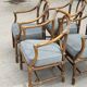 Set of 4 vintage McGuire rattan chairs with cushions.