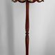 Art Deco floor lamp in carved walnut, stained glass shade, France, c. 1920