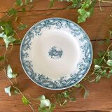 Plat à gâteau ancien sur piédouche en faïence de Sarreguemines