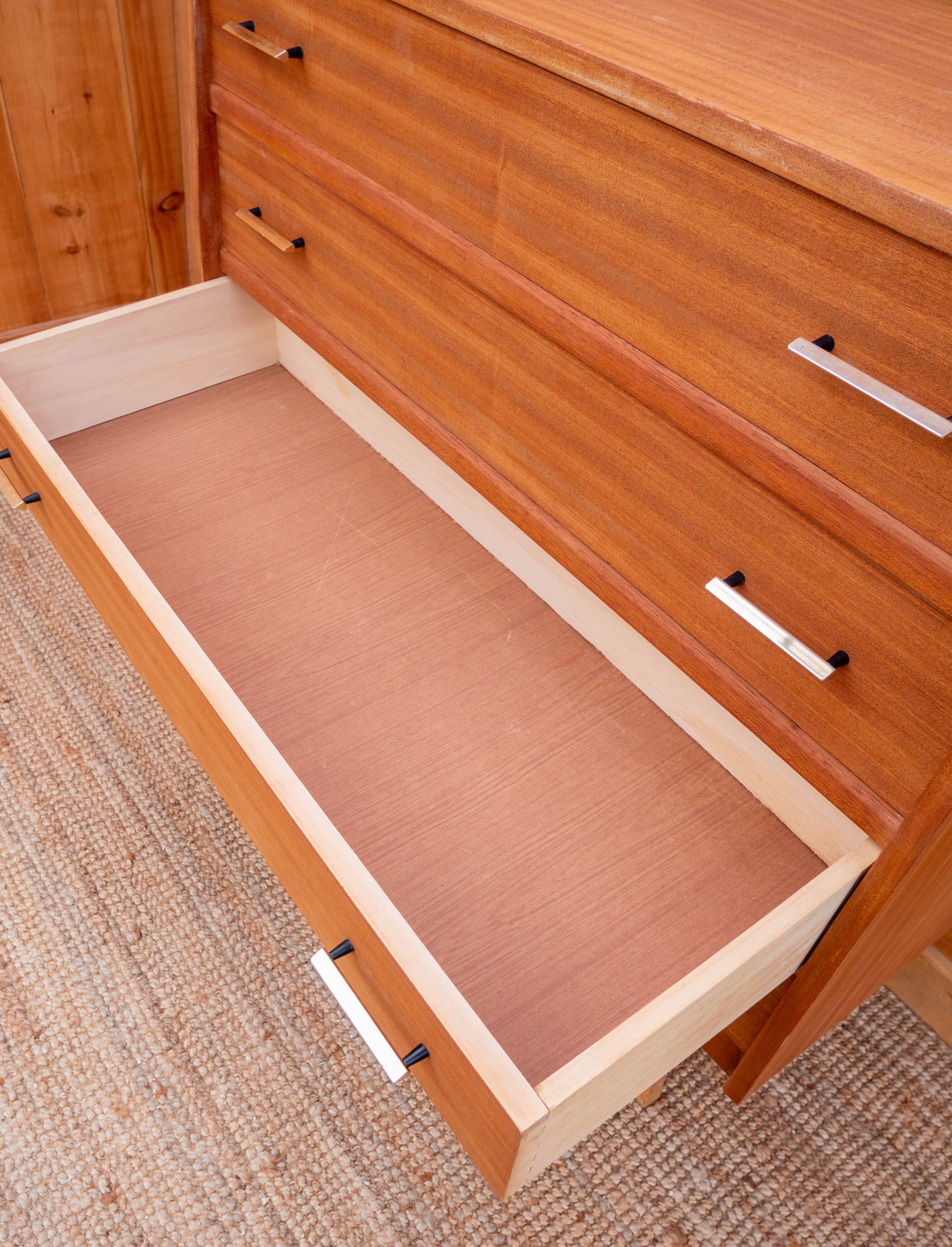 Compass feet chest of drawers