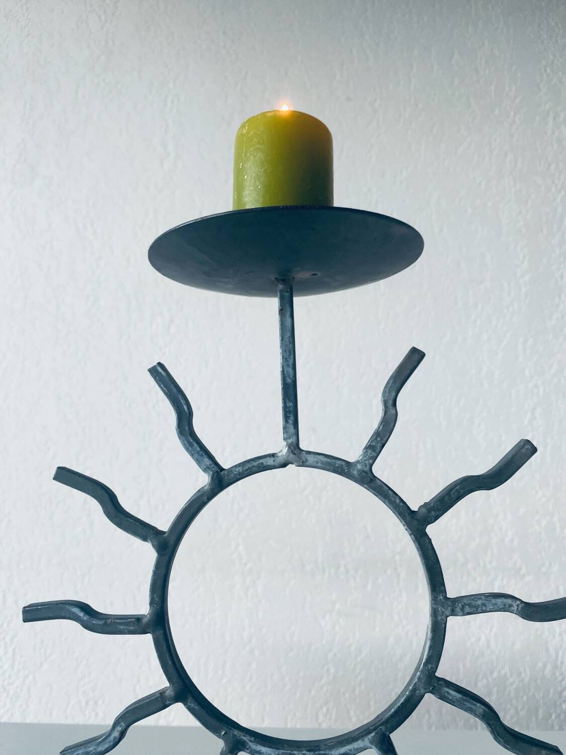 Iron sun candle holder