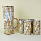 Pitcher and glasses with harlequin decoration, Atelier du Vieux Moulin