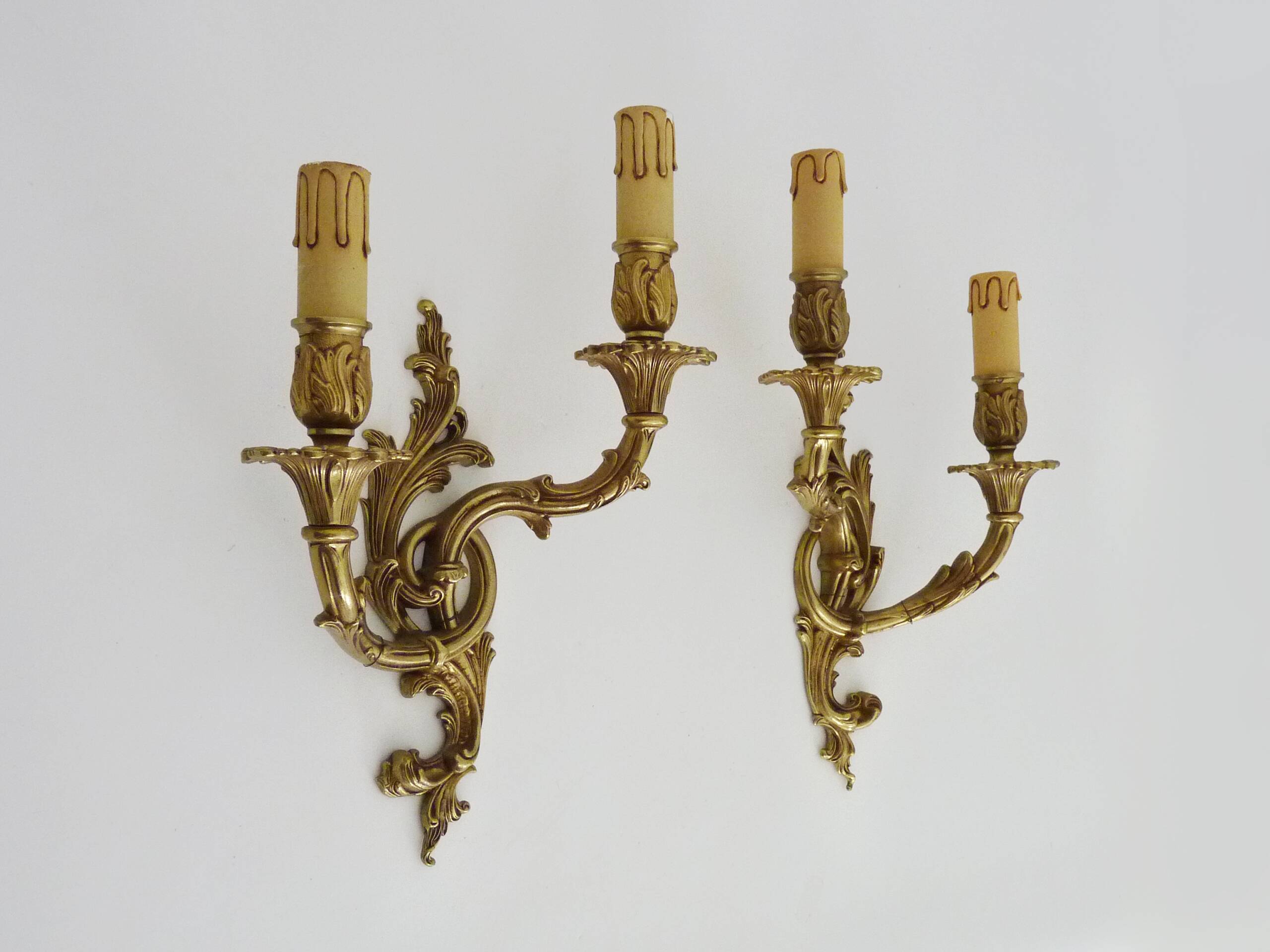 Vintage pair of double wall sconces in bronze from the 1960s.