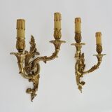 Vintage pair of double wall sconces in bronze from the 1960s.