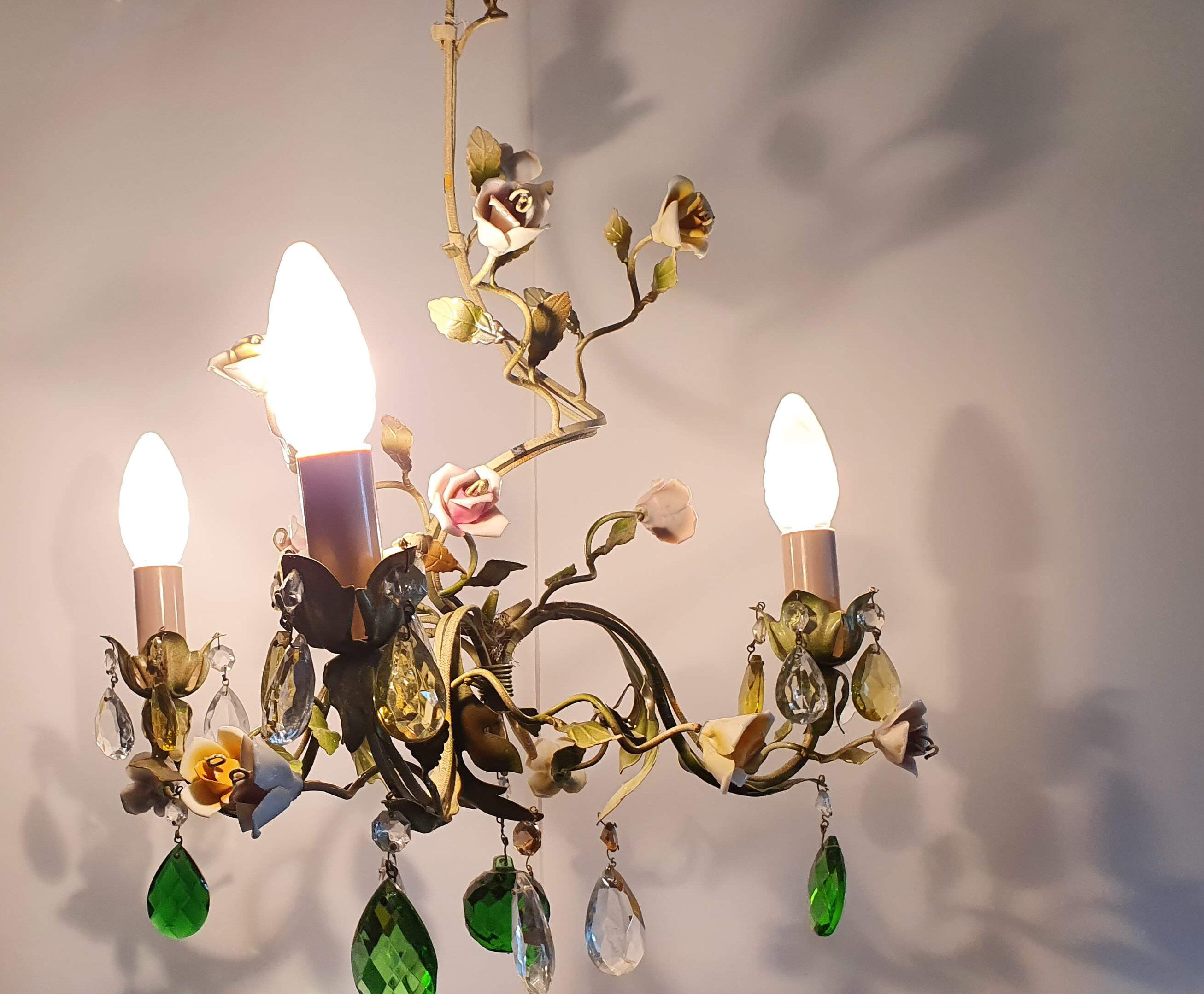 Painted metal chandelier and porcelain flowers