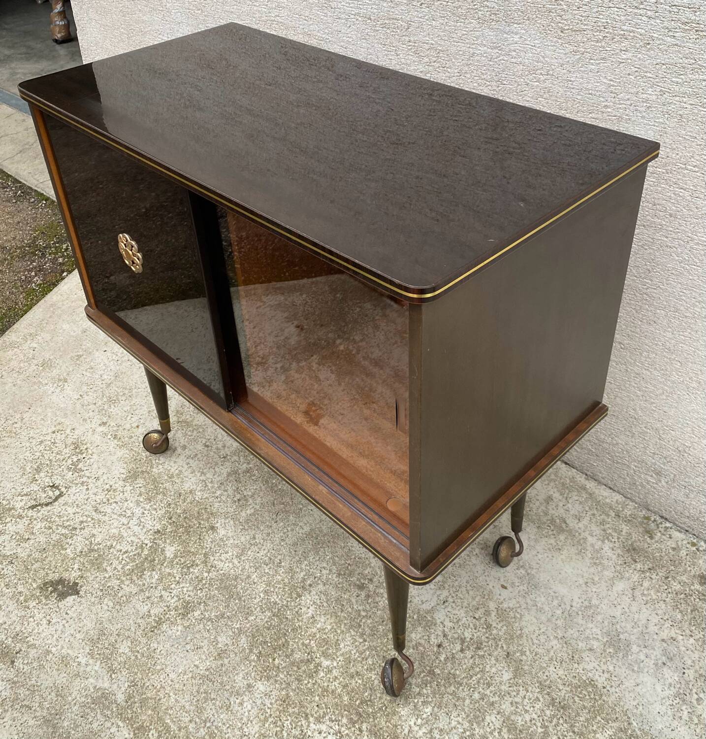 Vintage display bar cabinet on wheels from the 60s/70s.