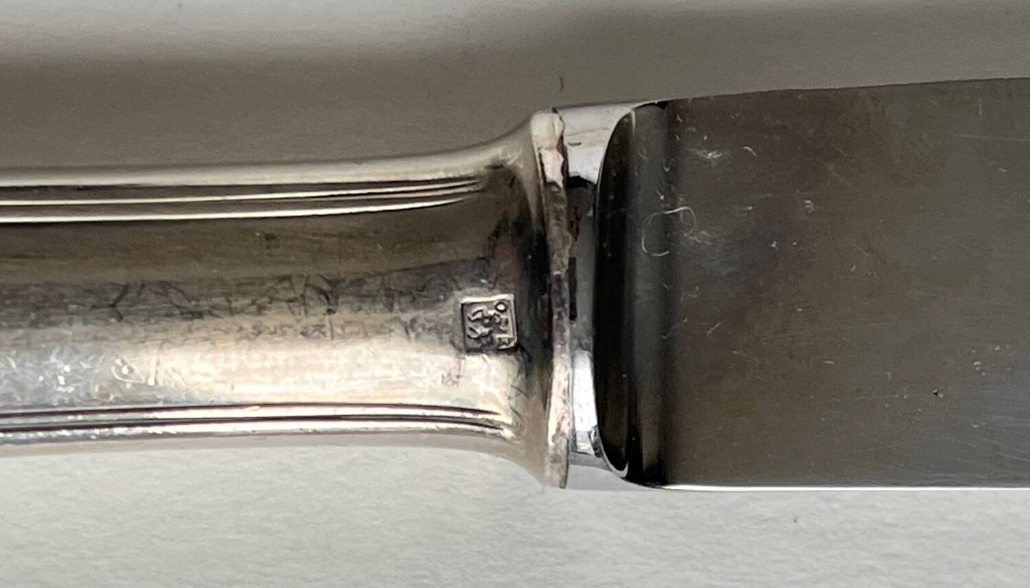12 silver metal knives