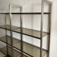 Pair of Artelano bookshelves in anodised metal and smoked glass, 1970s.