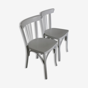 2 white Baumann chairs