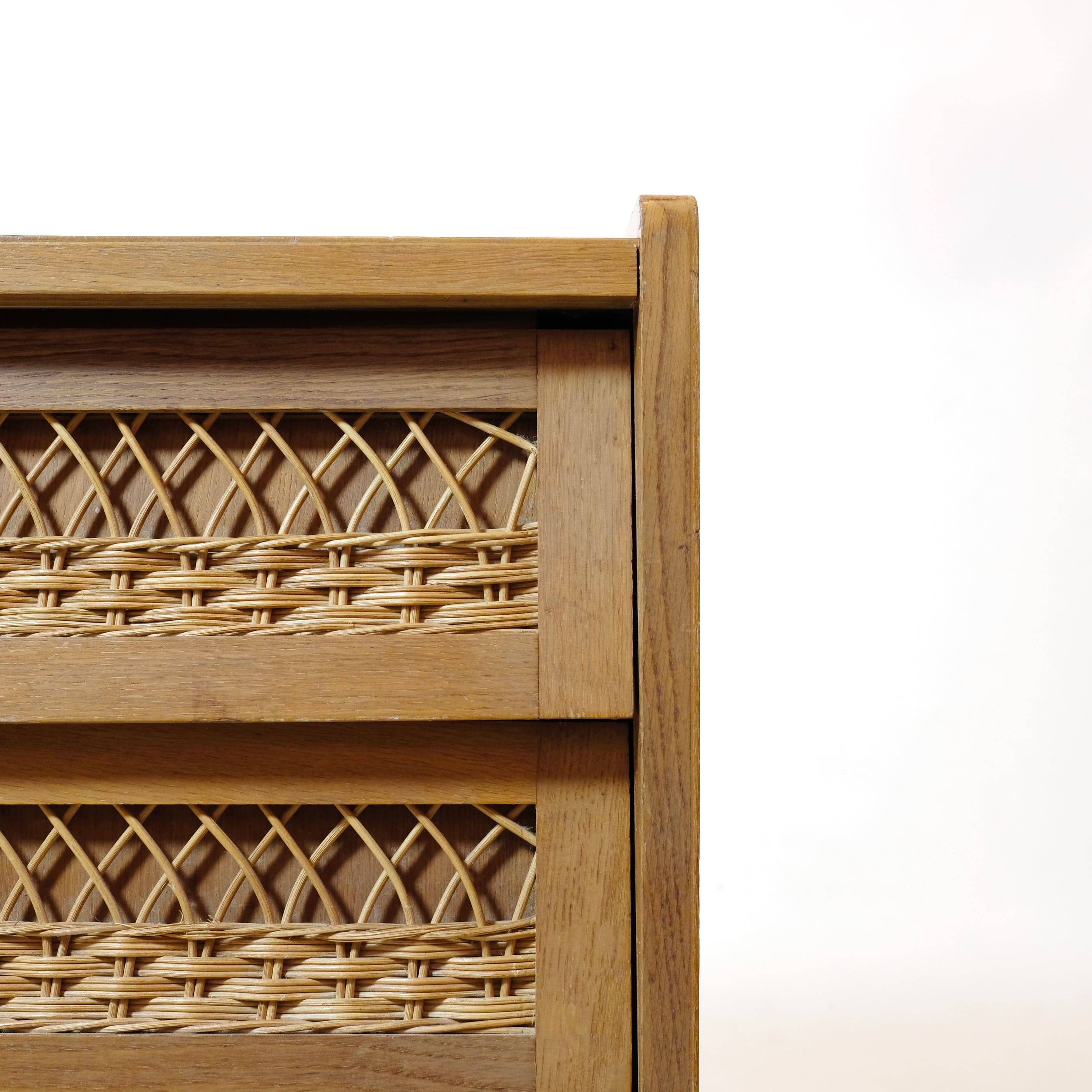 Wooden and rattan chest of drawers from the 60s.