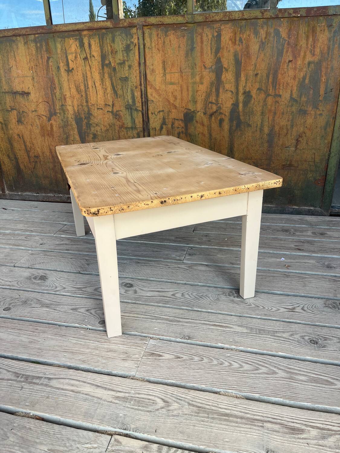 Raw wood and taupe coffee table