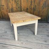 Raw wood and taupe coffee table