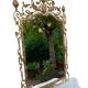Console and mirror set in brass, Louis XV Rococo style.