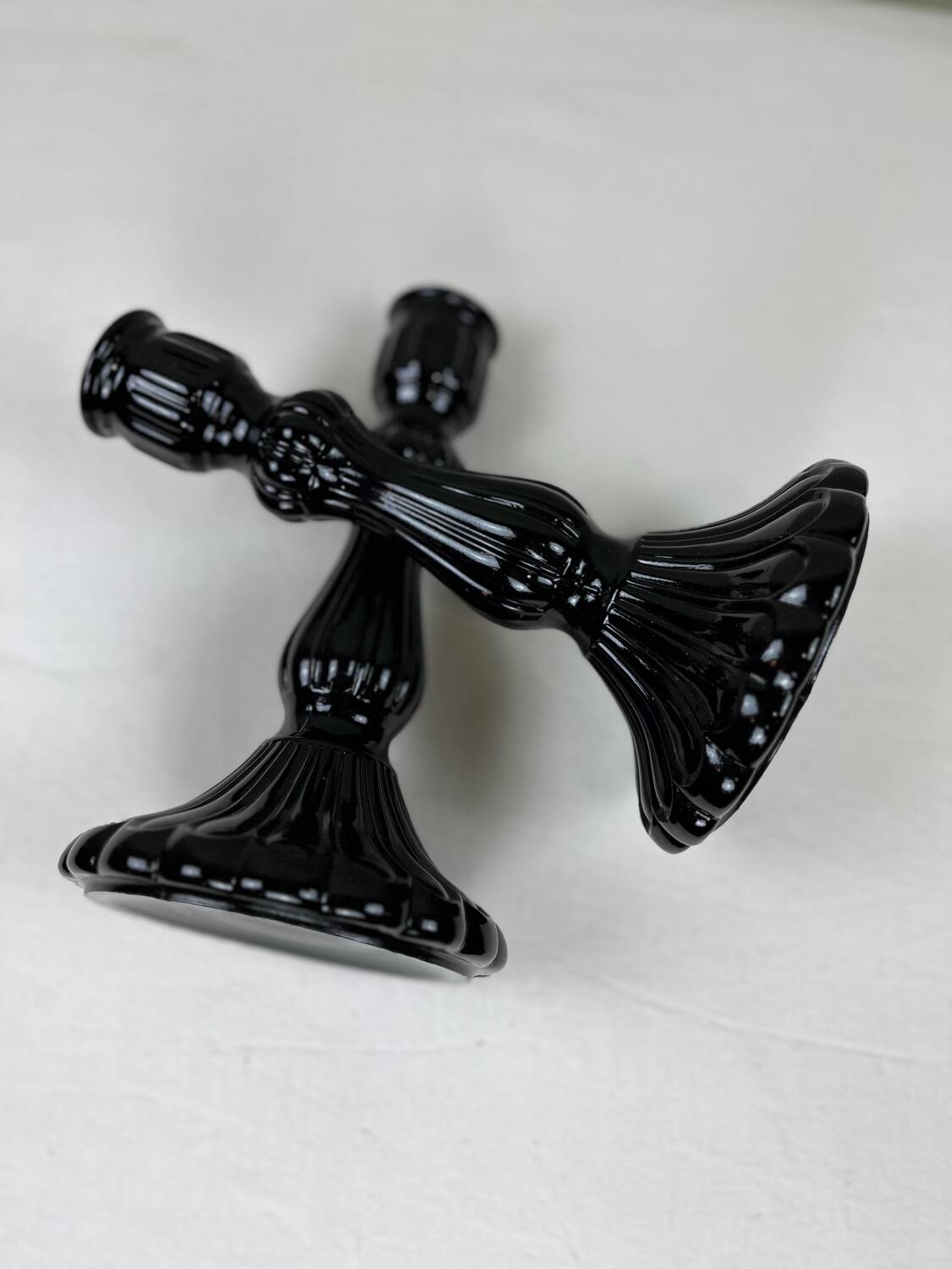 Pair of black opaline candlesticks