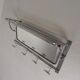 Art Deco wall coat rack with a bevelled mirror adjustable in a chrome frame, 1930s.