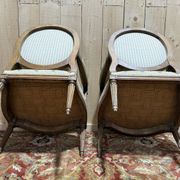 Pair of cabriole armchairs with medallion backs from the Louis XVI period, stamped OT.