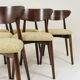Green and walnut fabric dining chairs