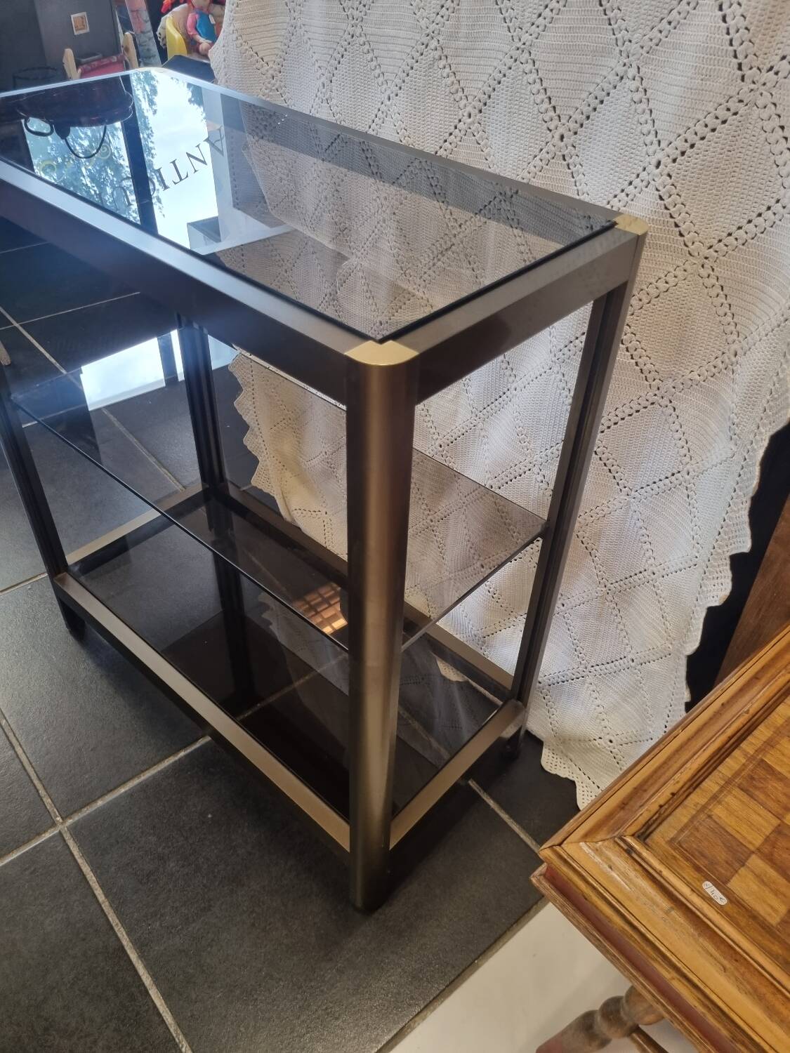 Vintage smoked glass console design