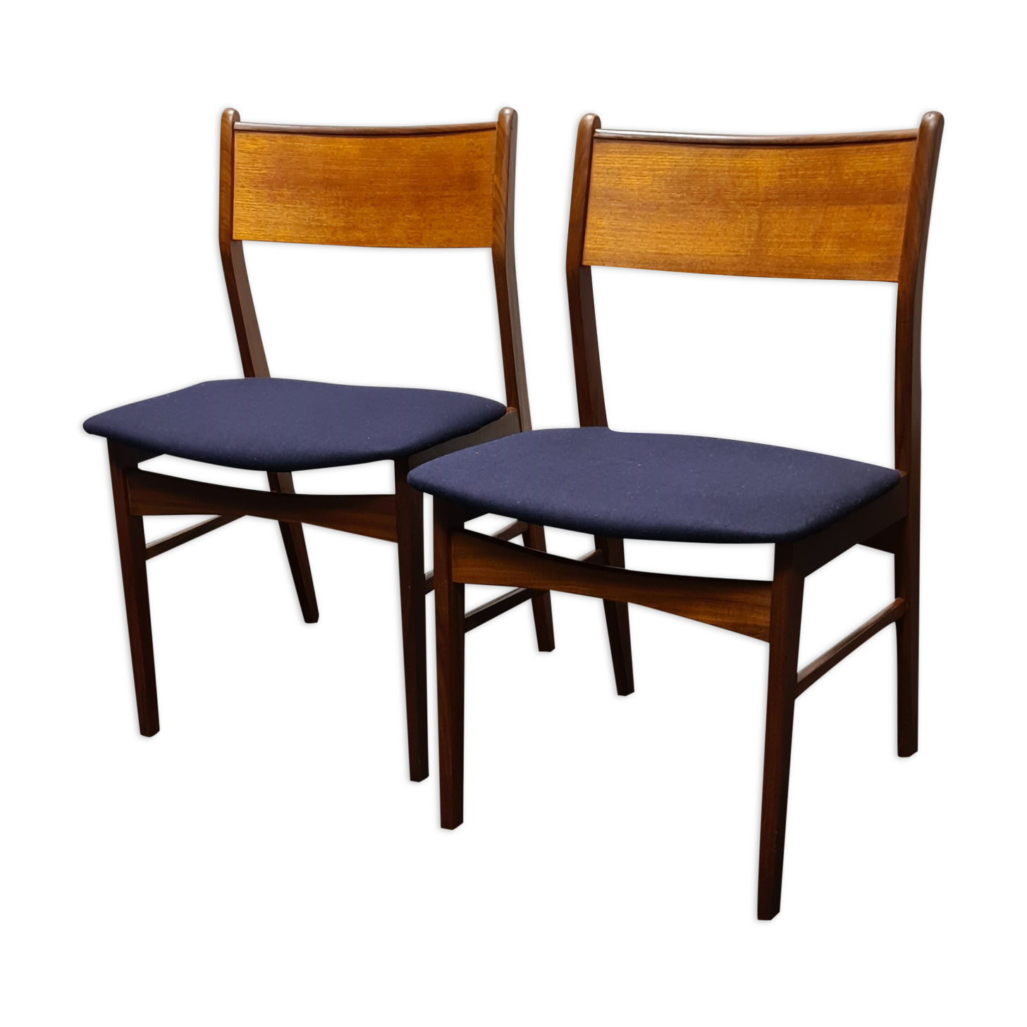 A pair of vintage teak dinning chairs