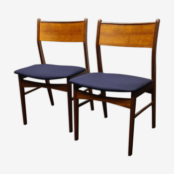 A pair of vintage teak dinning chairs