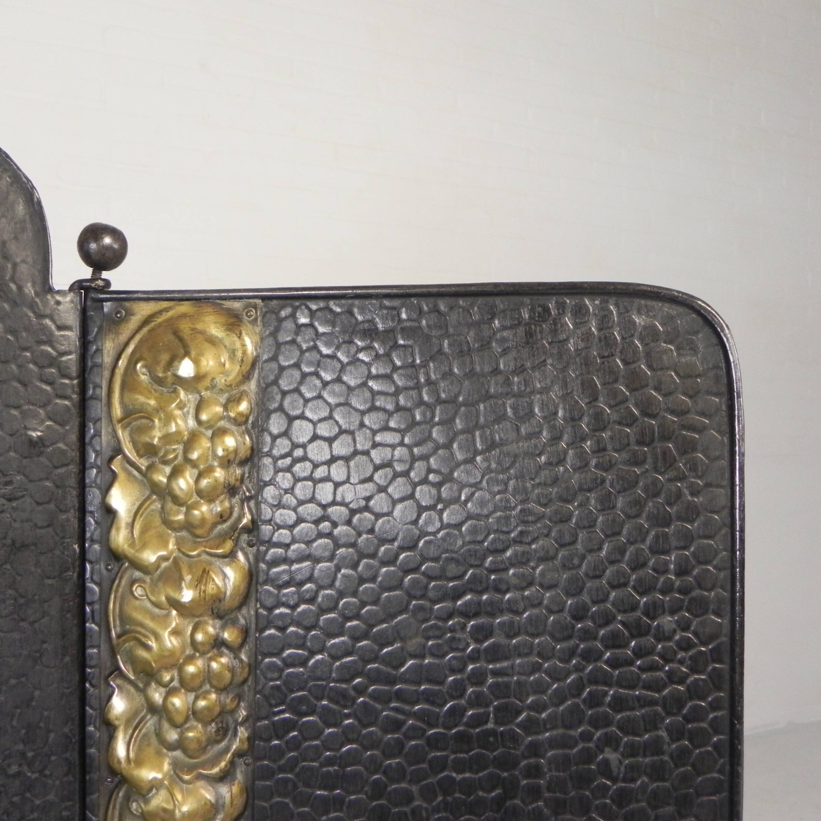 Art Deco screen in steel with brass details, 1930s.