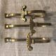 Lot of 3 bronze coat racks
