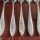 12 silver-plated metal condiment forks for shellfish by Christofle, Albi model.