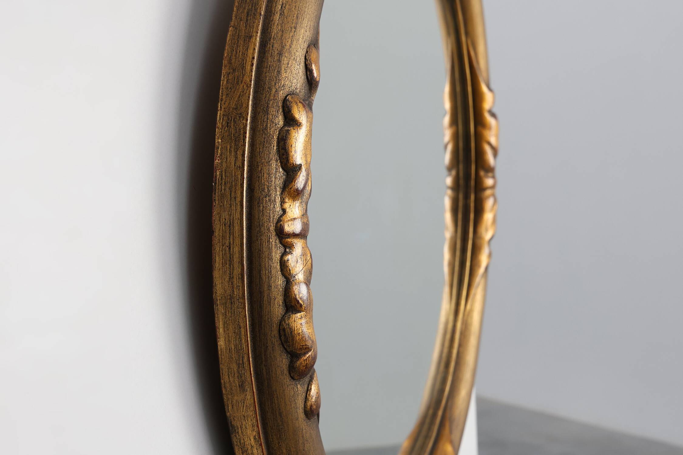 Art Deco oval gilt oak mirror, Belgium 1920s