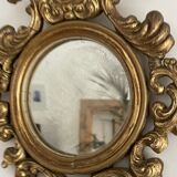 Old mirror in gilded wood