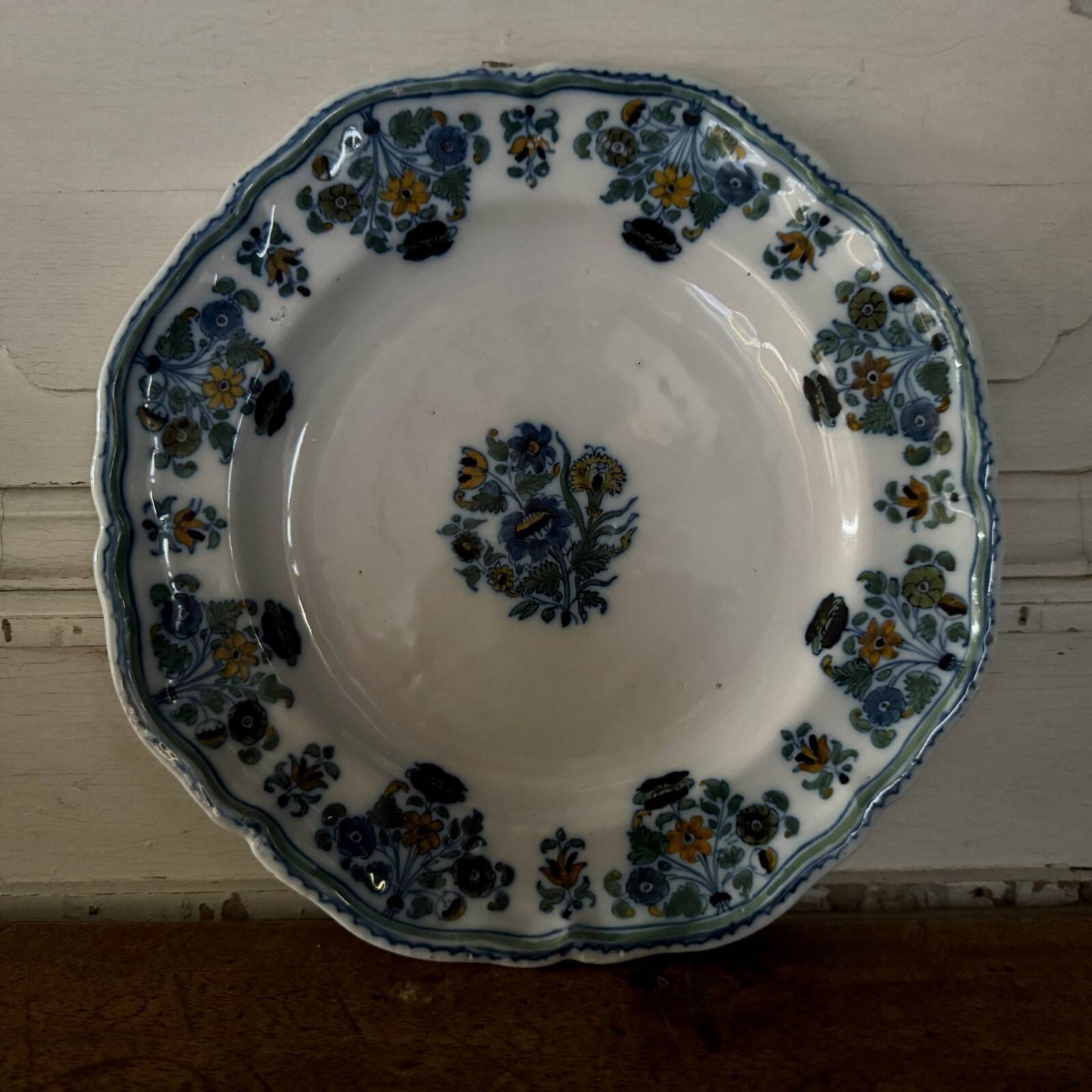 18th-century Moustiers earthenware plate with floral decoration