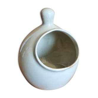 Beige glazed ceramic salt hand