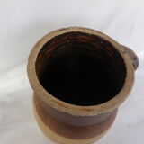 Old stoneware milk jug