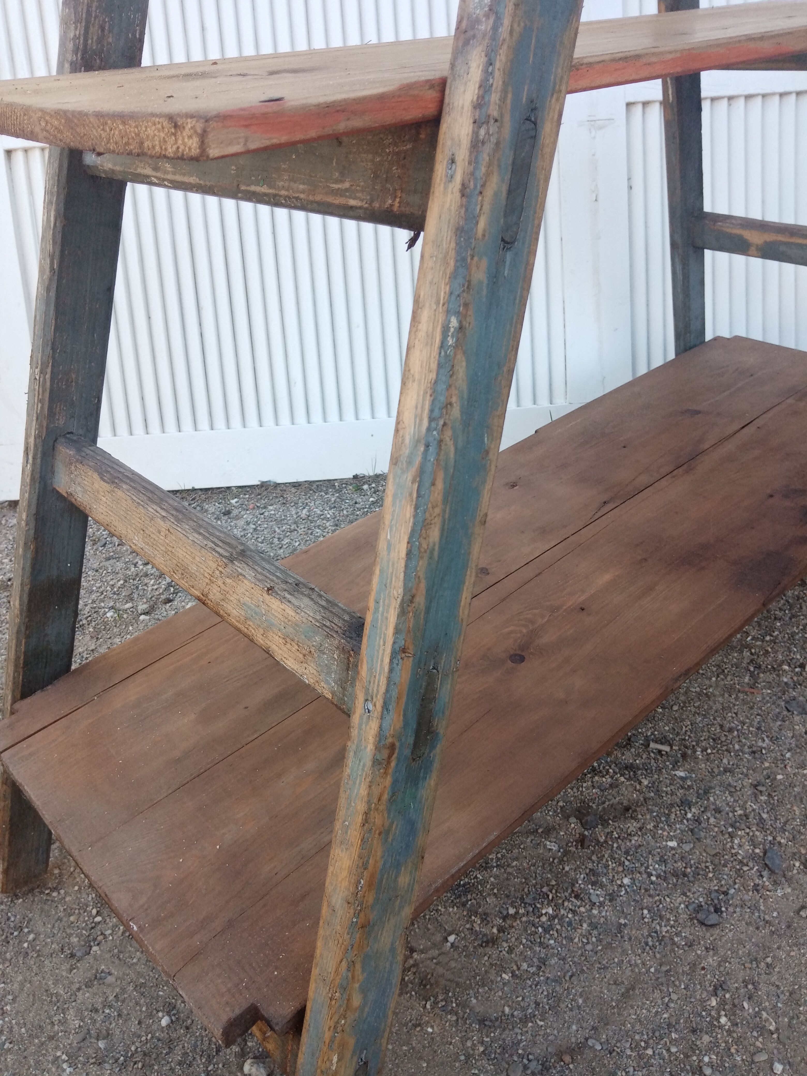 Old stepladder wooden shelf