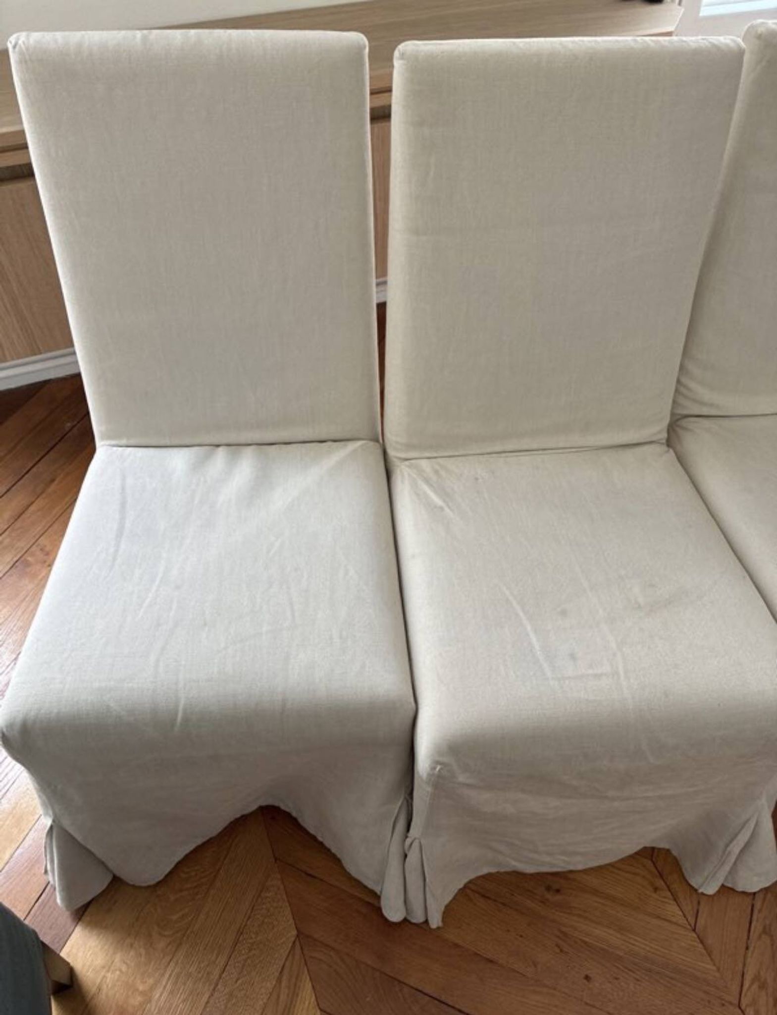 Set of 6 Maxalto chairs with covers.