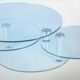 Table basse trois plateaux pivotants en verre