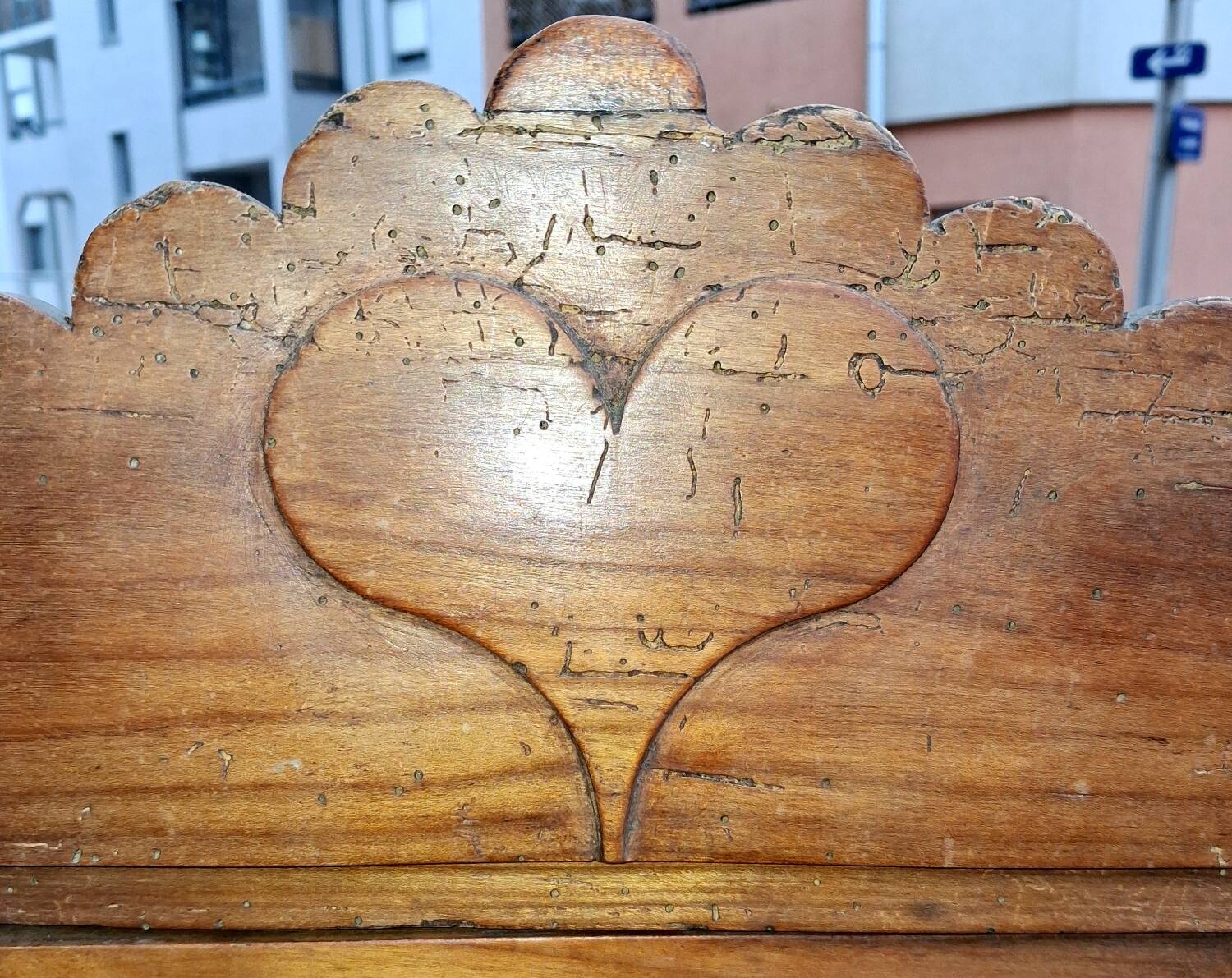 Showcase of popular art in solid wood, carved heart.