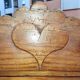 Showcase of popular art in solid wood, carved heart.